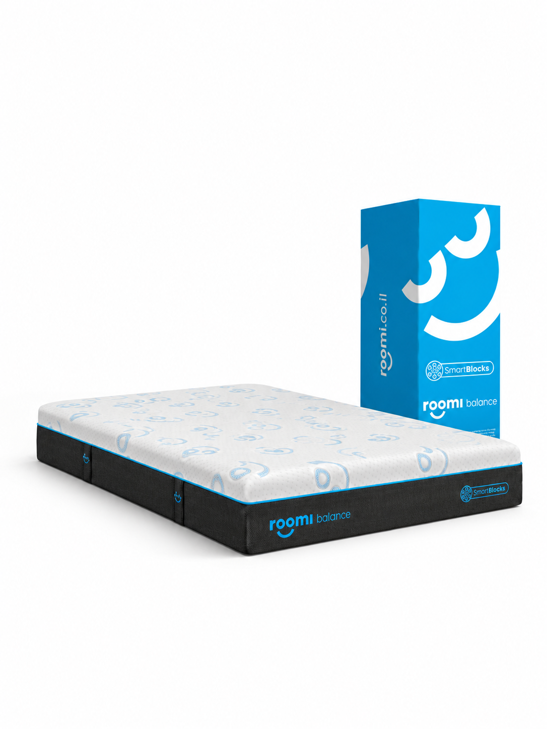 מזרן Roomi Balance SmartBlocks® מעוטר בדוגמה, לצד קופסת משלוח כחולה וגבוהה.